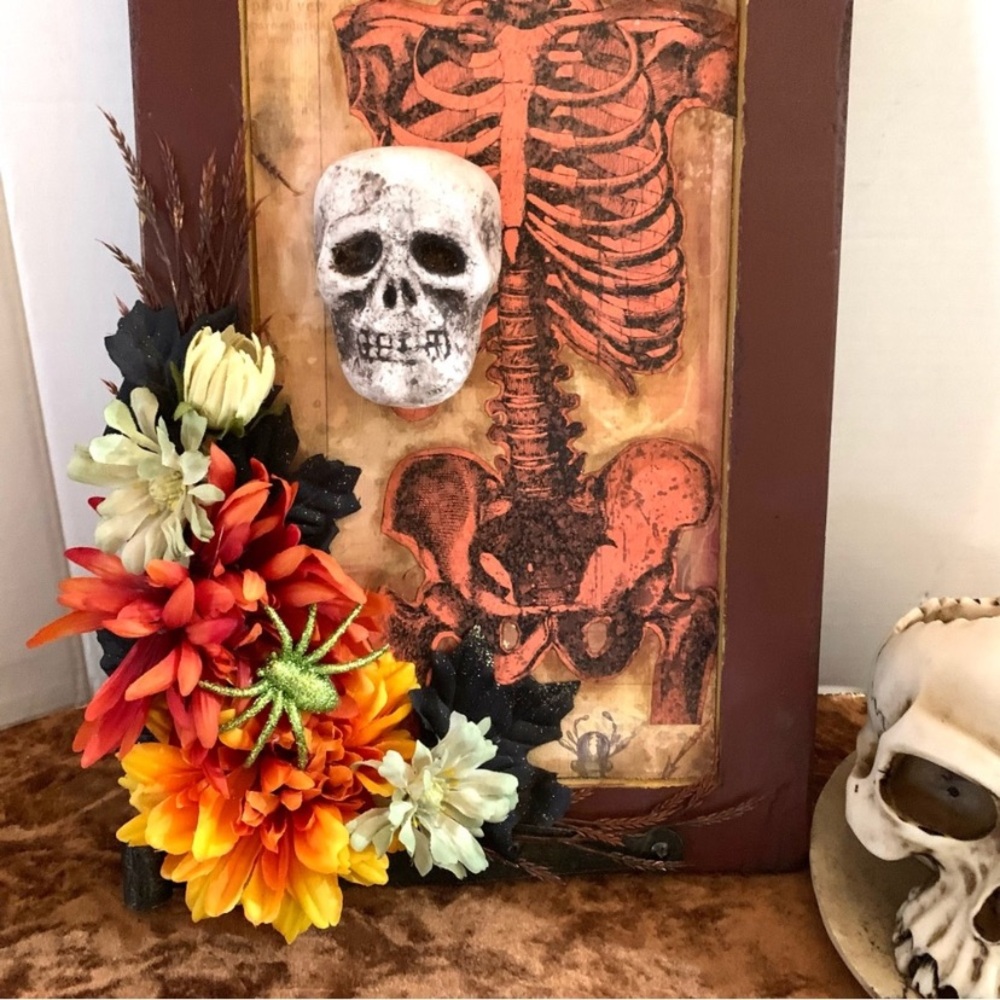 "Spooky" skeleton wall art with floral accents. - Picture 3 of 9